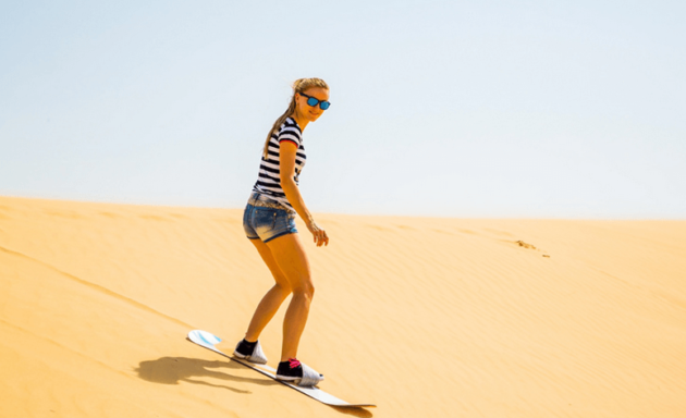 sandboard in sahara desert